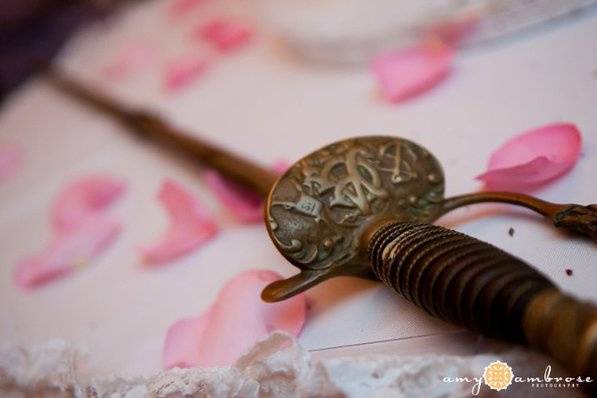 The sword used to cut the wedding cake is a long standing tradition for weddings in the bride's family.