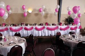 Table setup with balloons centerpiece