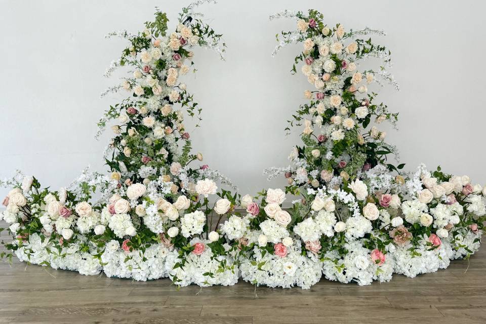 Olivia pillar and aisle flowers