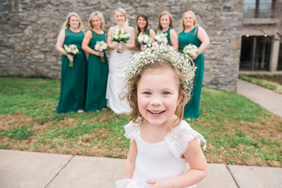 Flower girl with the bride and bridesmaids