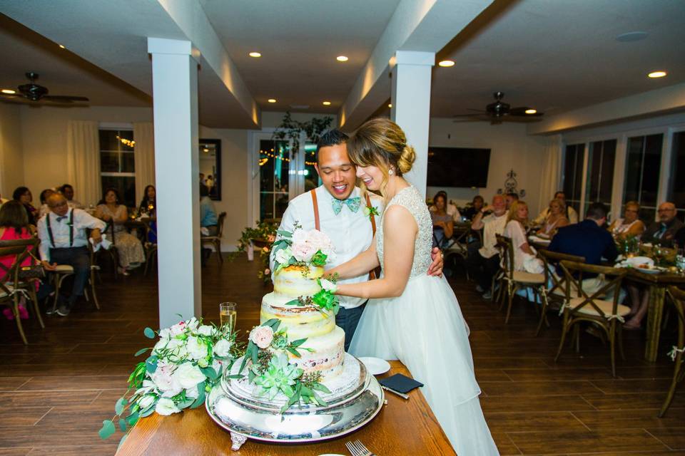 The Black Stallion | OBX WeddingPhotography: Maite PhotographyCoordination: The Proper SettingDecor: Bells & WhistlesMusic: DJ BruceCaterer: Ocean BoulevardDessert: Just DessertsRentals: Ocean Atlantic Rentals, I Do OBX ChairsHair & Makeup: Lovies Salon & Spa