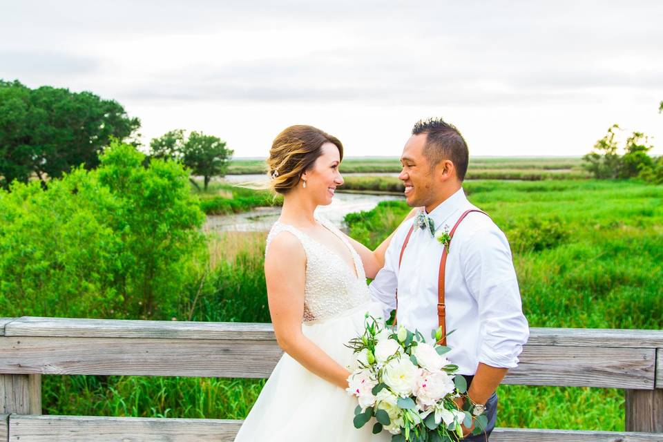 The Black Stallion | OBX WeddingPhotography: Maite PhotographyCoordination: The Proper SettingDecor: Bells & WhistlesMusic: DJ BruceCaterer: Ocean BoulevardDessert: Just DessertsRentals: Ocean Atlantic Rentals, I Do OBX ChairsHair & Makeup: Lovies Salon & Spa