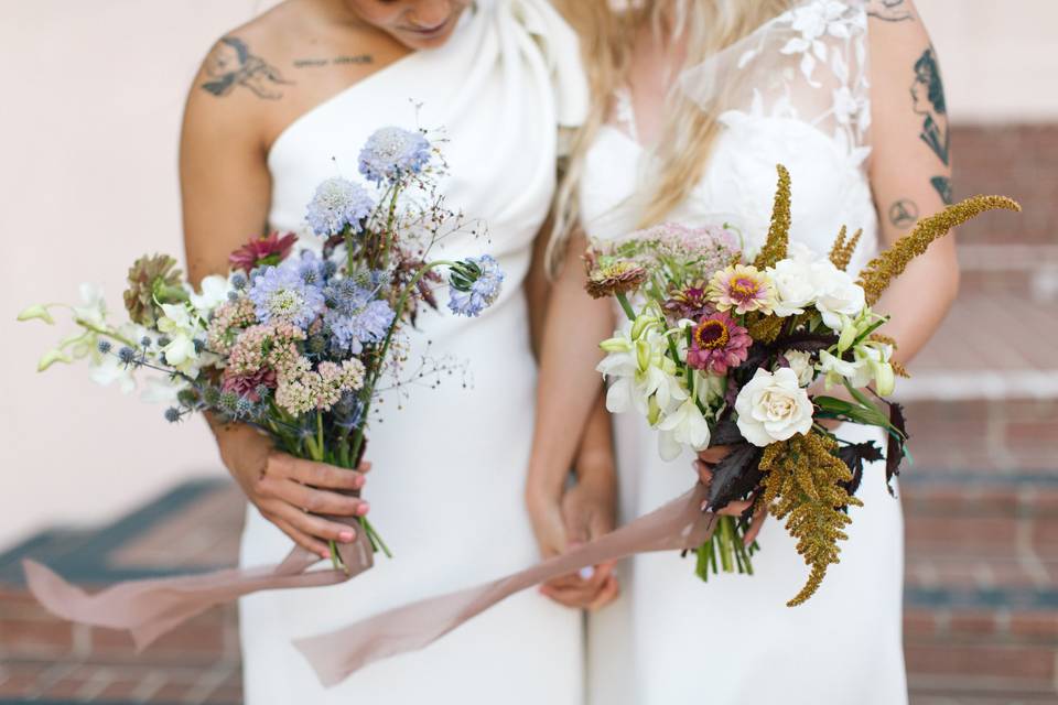 Brides holding florals