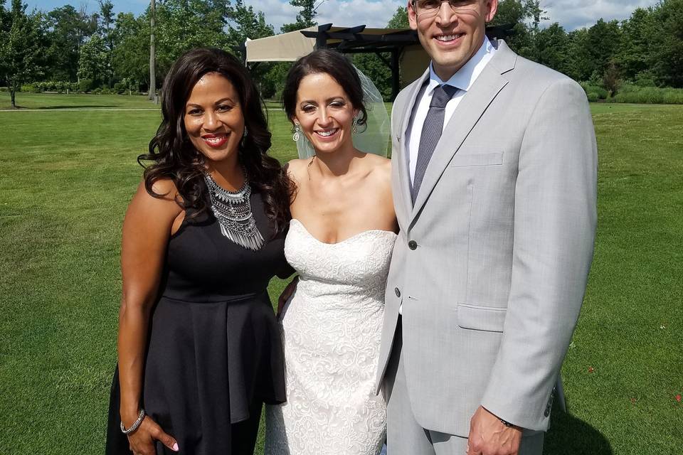 Officiant and the newlyweds