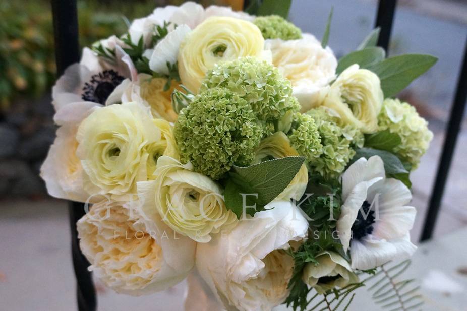 Grace Kim Floral & Event Design- cream bridal bouquet: garden roses, ranunculus, anemones, viburnum, sage, umbrella fern