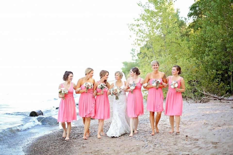 Bride and bridesmaids at the beach