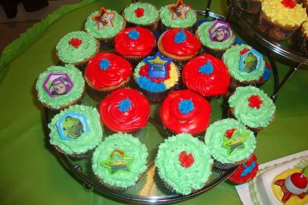 The cupcakes were placed on a three tier cake tray.  This was very helpful for the overview of the entire table.  It gave the eye much to look at and appreciate