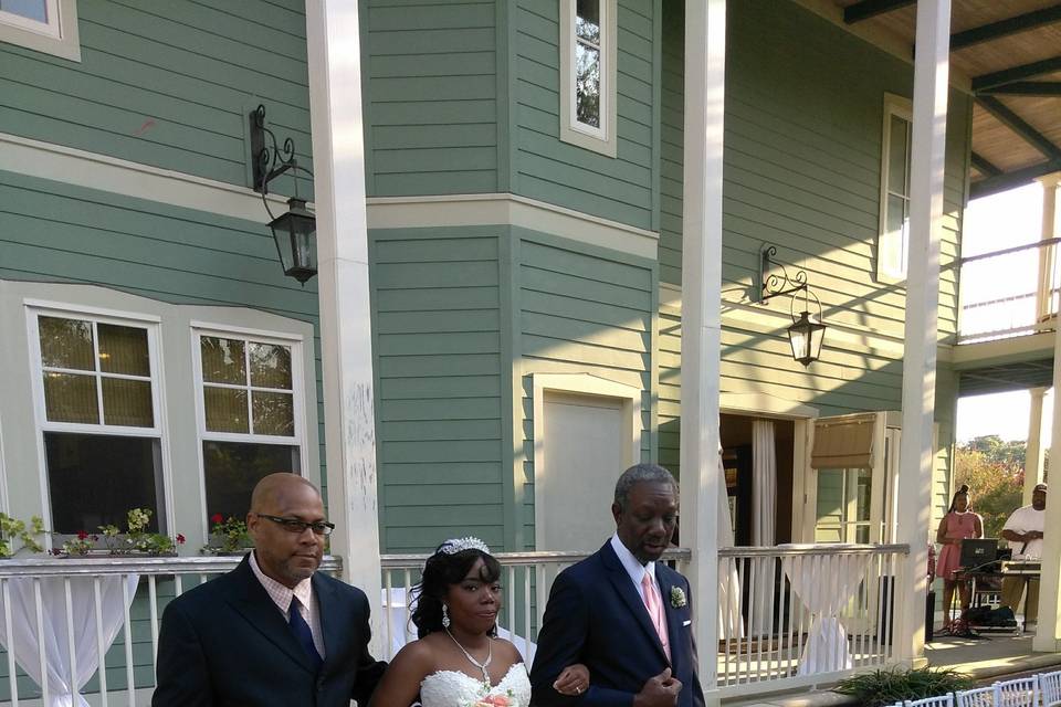 Bride being escorted to Alter