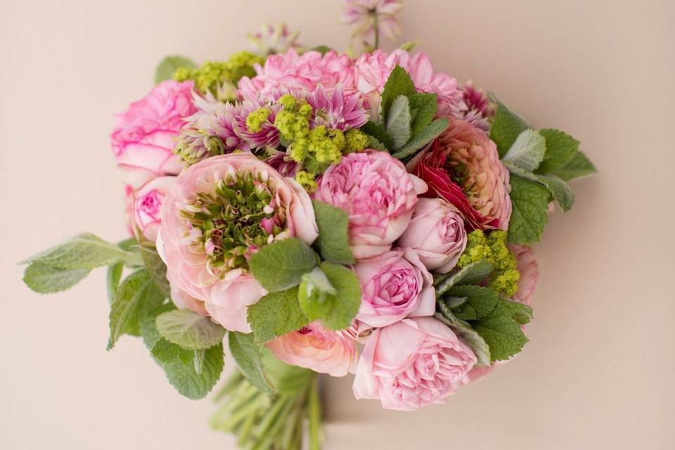 Classic hand-tied bridal bouquet with spring flowers