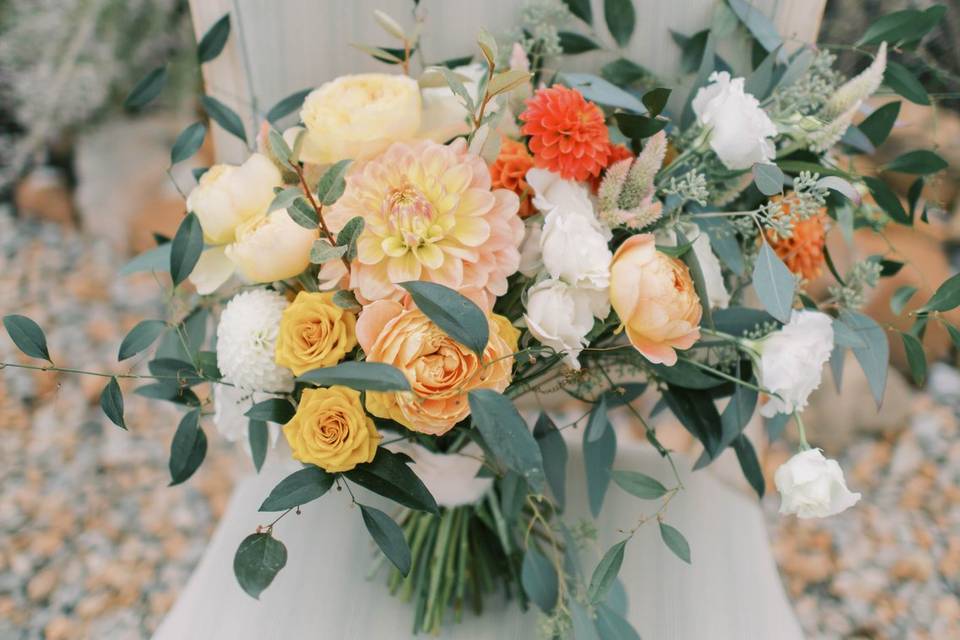 Rust and citrus bridal bouquet