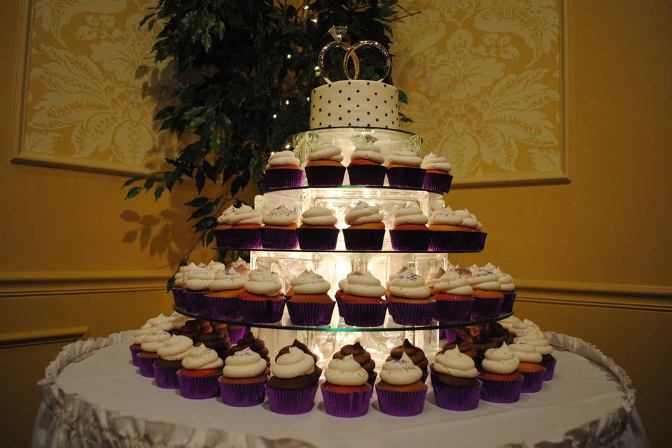 Wedding cake and cupcakes