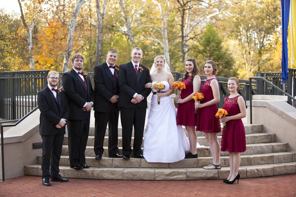 The couple with the bridesmaids and groomsmen