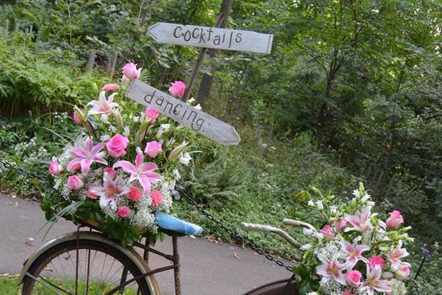 bicycle wedding at Morris Arboretum, Philadelphia
Garden Bike with flowers .
Cocktails and dancing signs