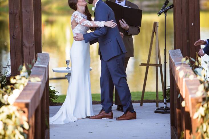 The bride and groom celebrate at the end of a beautiful ceremony