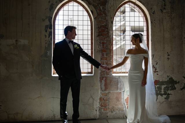 Wedding couple holding hands