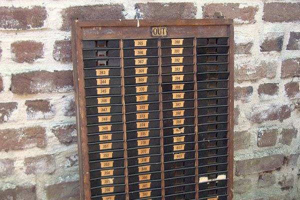 vintage wooden time card rack