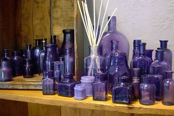 small antique purple bottles