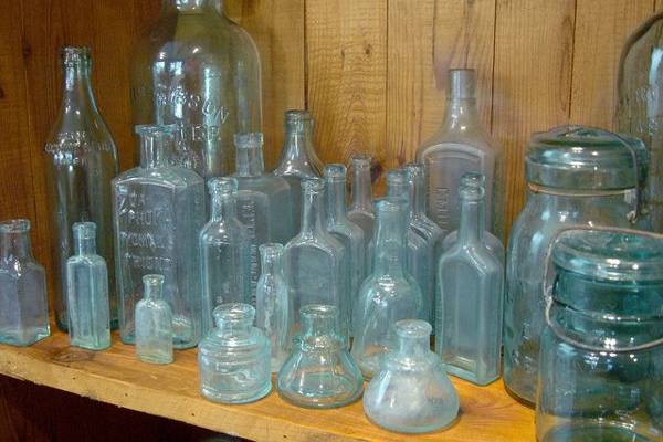 small antique pale blue bottles