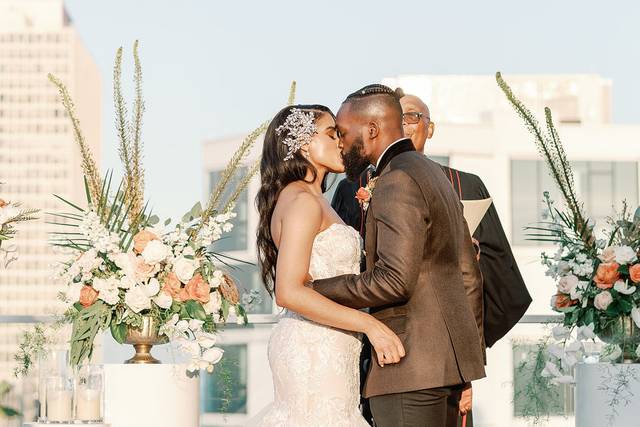 Couple kissing during ceremony