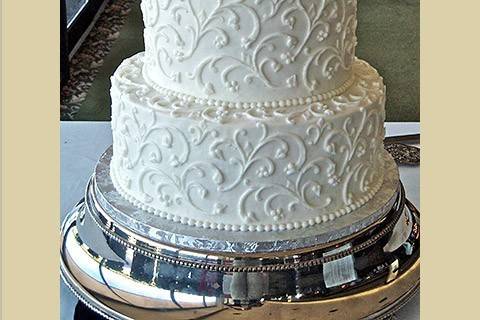 Three tier cake with embellishments