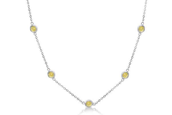 Fancy Yellow Diamond Station Necklace	Seven chic yellow canary diamonds shimmer in this diamond chain necklace. Available in carat weights from 0.15ct-4.00ct.