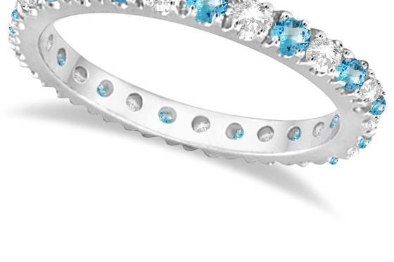 Diamond & Blue Topaz Eternity Ring	Ice is the theme for this striking topaz and diamond eternity ring, in gold or a custom precious metal of your choice.