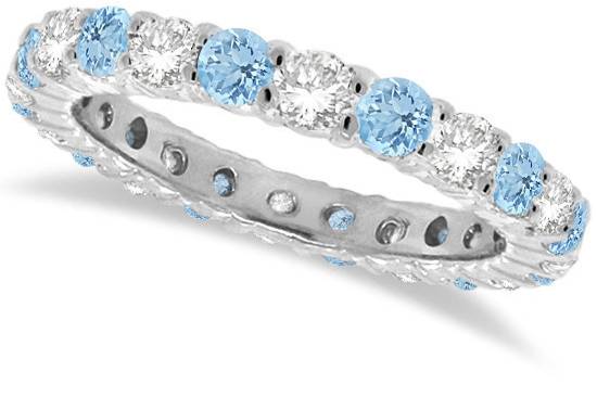 Aquamarine & Diamond Eternity Ring	Nearly 30 blue and white semi-precious stones cover this stunning gold band, which is also available in custom metals.