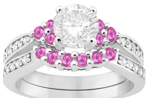 Floral Diamond & Pink Sapphire Engagement Ring Set	Pretty in pink, these bead-set side stones accent your choice of center jewel in a gold, platinum, or palladium band.