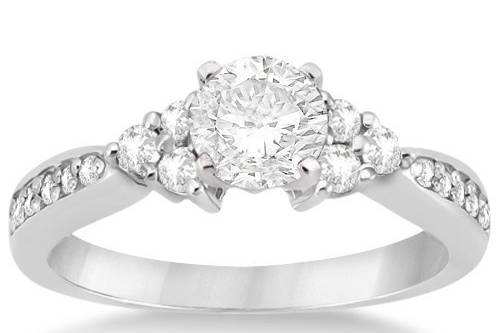 Diamond Floral Engagement Ring	A custom center stone, accented by bead-set diamonds. Available in your choice of 14/18k gold, platinum, or palladium.