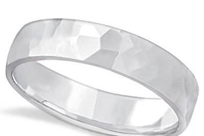 Hammered Finished Carved Wedding Band	A rough exterior hides a rounded comfort-fit interior for this stylish ring, available in an array of precious metals.