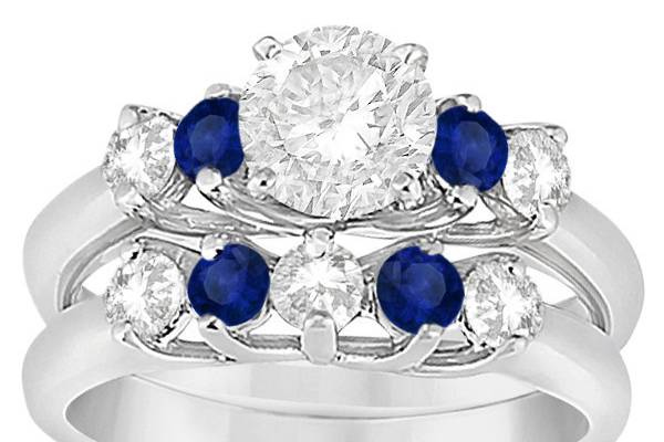 Five Stone Diamond and Sapphire Bridal Ring Set	Four brilliant sapphires and five diamonds surround your choice of center stone in a customizable precious metal band.