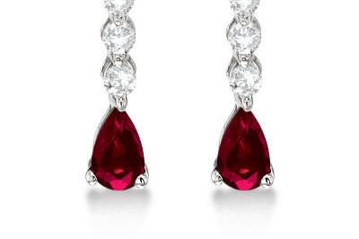 Pear Ruby & Diamond Graduated Drop Earrings	These slim designer graduated dangling drop earrings feature a custom gem of your choice in any color of 14k gold.