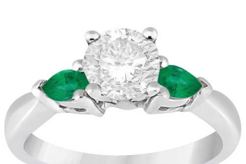 Pear Cut Three Stone Emerald Engagement Ring	Two pear-cut emeralds offset your choice of center stone. Design your own engagement ring in a range of pecious metals.