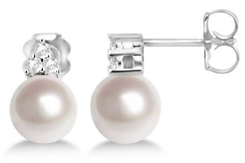 Freshwater Cultured Pearl & Diamond Stud Earrings  (7-7.5mm)	A sophisticated pair of freshwater cream colored pearls, each adorned with approximately 0.13ctw of round cut diamonds.