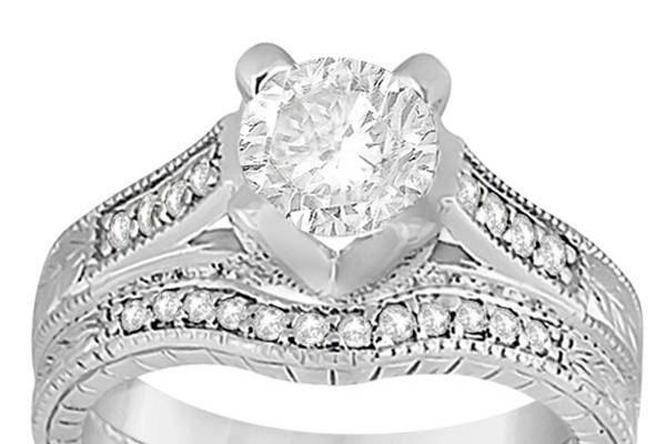 Antique Style Engagement Ring and Matching Wedding Band	Fifty brilliant diamonds are featured in a classically inspired engagement set. Choose your own metal and center stone!