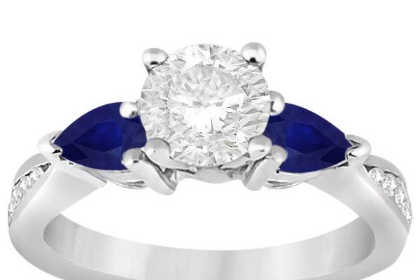 Diamond & Pear Blue Sapphire Engagement Ring	Two pear-shaped gems flank the center stone, with 10 diamonds on the band. Available in white, yellow, rose gold & more.