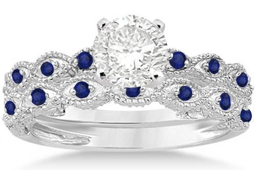 Antique Blue Sapphire Engagement Ring Set	This antique engagement ring & wedding band set in any metal has 16 quality pave set sapphires & a custom center stone.