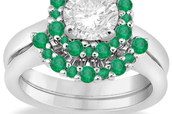 Halo Green Emerald Engagement Ring & Band	A dazzling array of prong set emeralds adorn this bridal wedding set, with a selectable metal band & center stone.