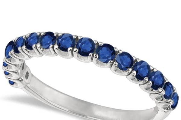 Blue Sapphire Semi-Eternity Ring Band	Classic elegance & modern style meet in this nontraditional wedding band, set with fifteen round September birthstones.