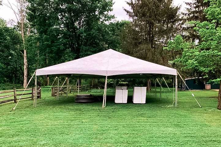 TENT ON GRASS WITH CHAIRS
