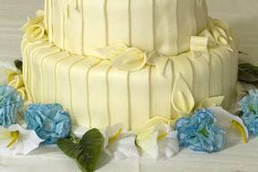 Pleated fondant covered cake with hand-made fondant calla lilies.