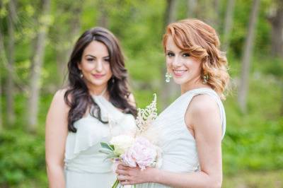 Holding their bouquets