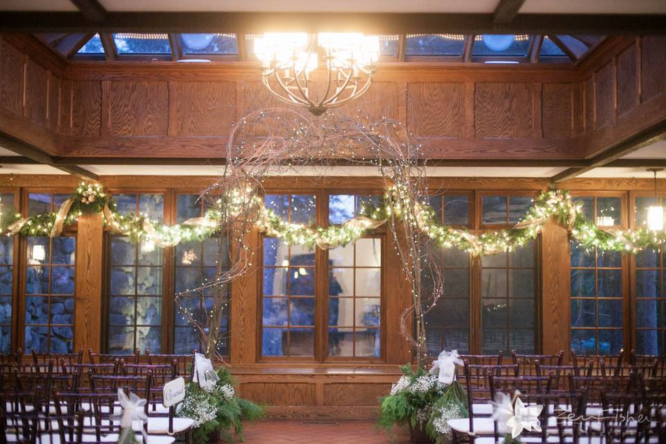 Holiday wedding with lighted arch at Willowdale Estate