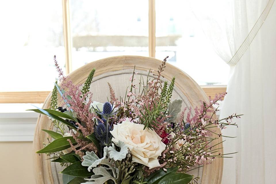 Bouquet sitting on a chair