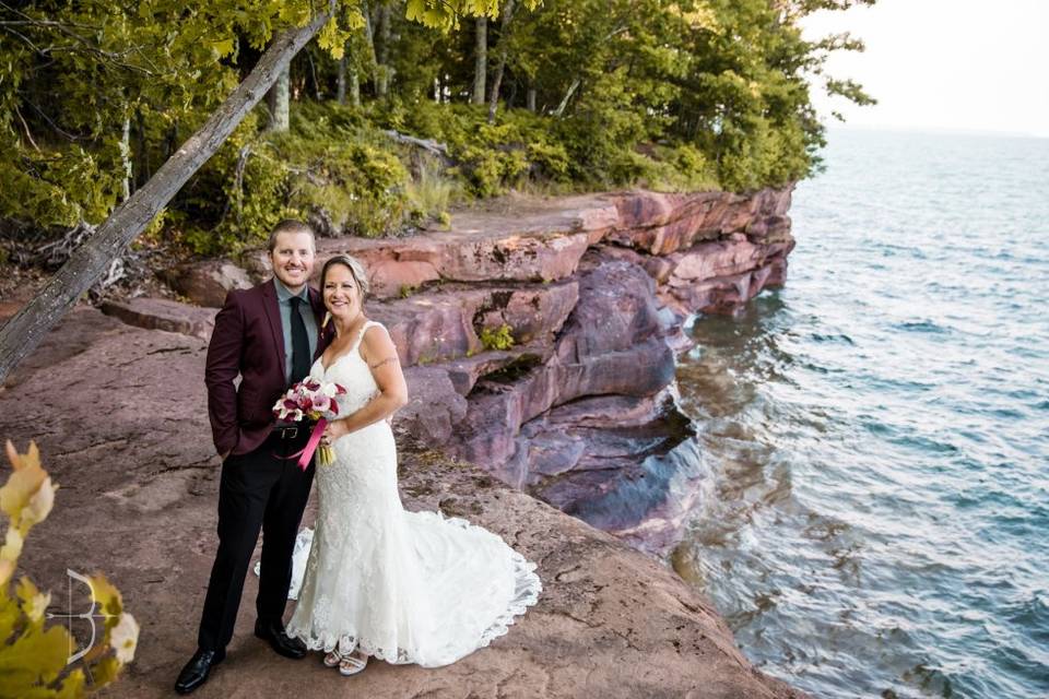 Holding each other by the sea