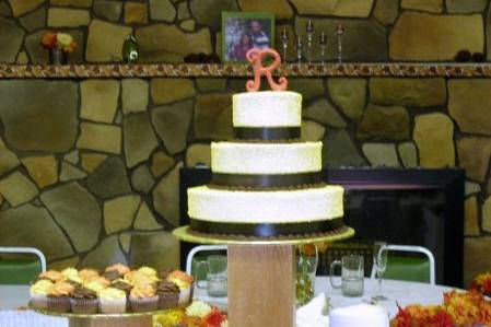 Wedding Cake plus cupcakes on oak stands