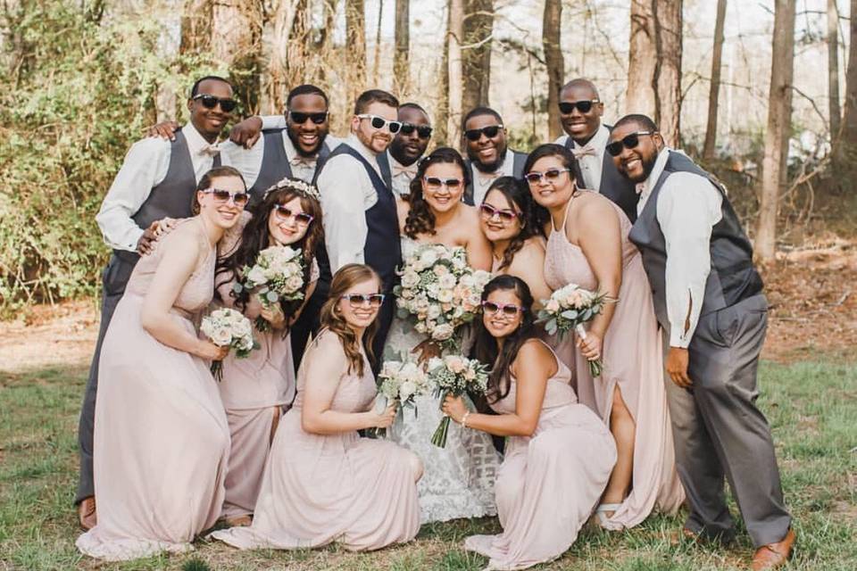 Newlyweds and their guests in shades