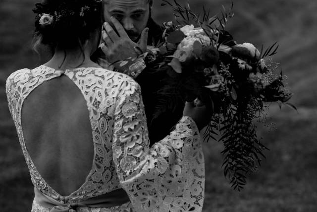 Groom crying during first look