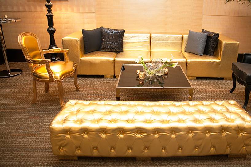 Gold Metallic Straight Modular Sofa Paired with Gold & Black Chateau Chairs by Marbella Event Furniture and Décor Rental