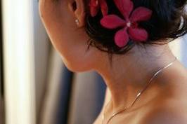 Low bun with pink flowers